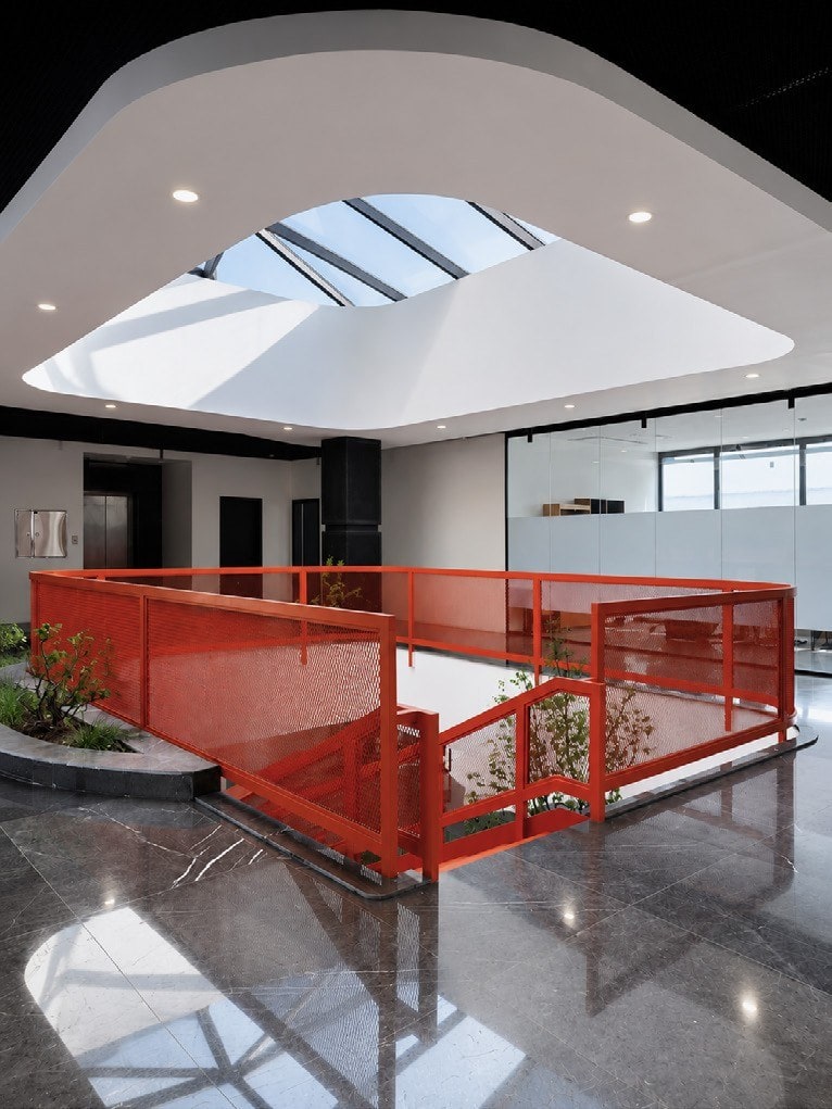 Central skylight and red stair