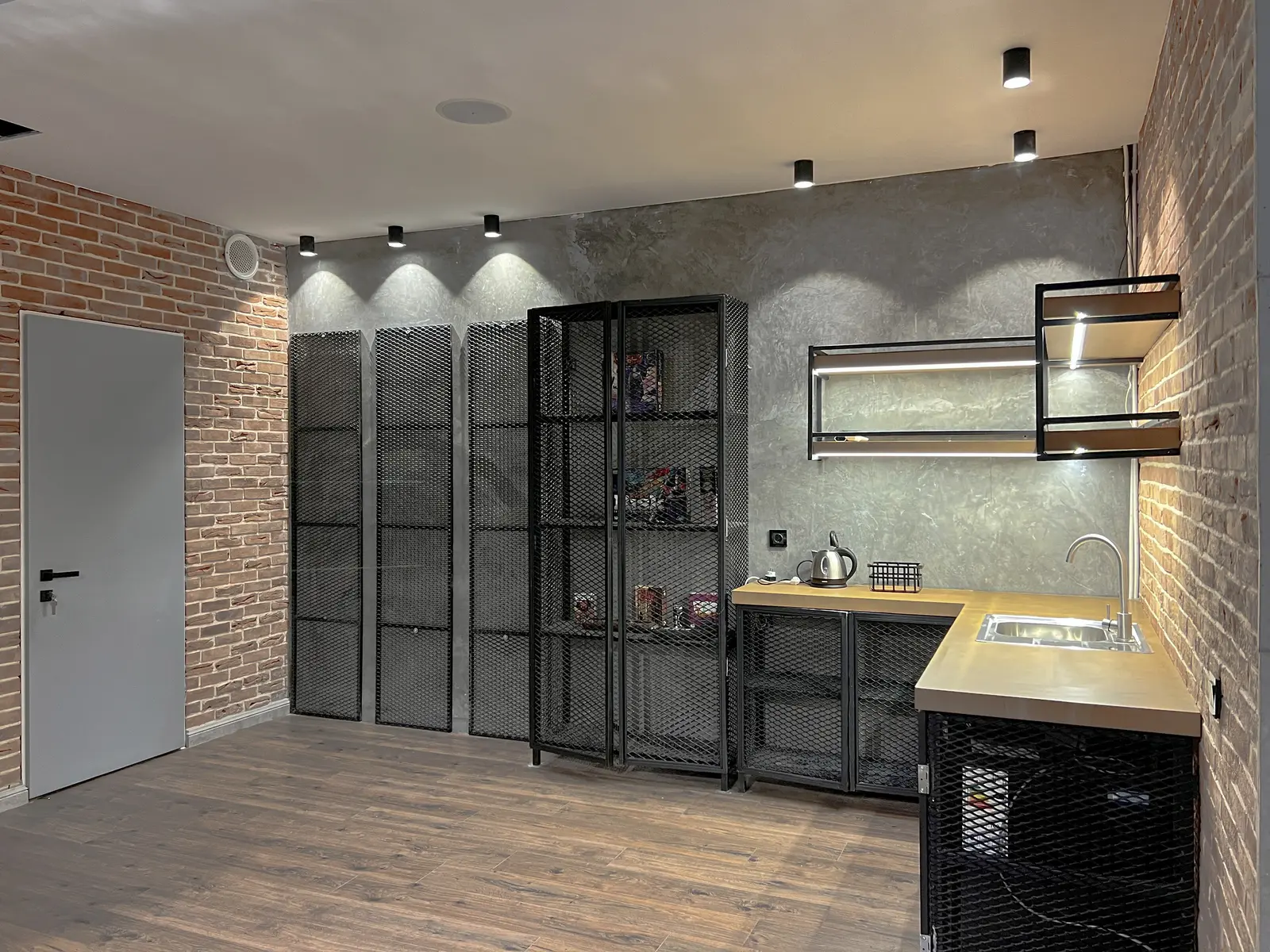 Basement lounge with brick and steel