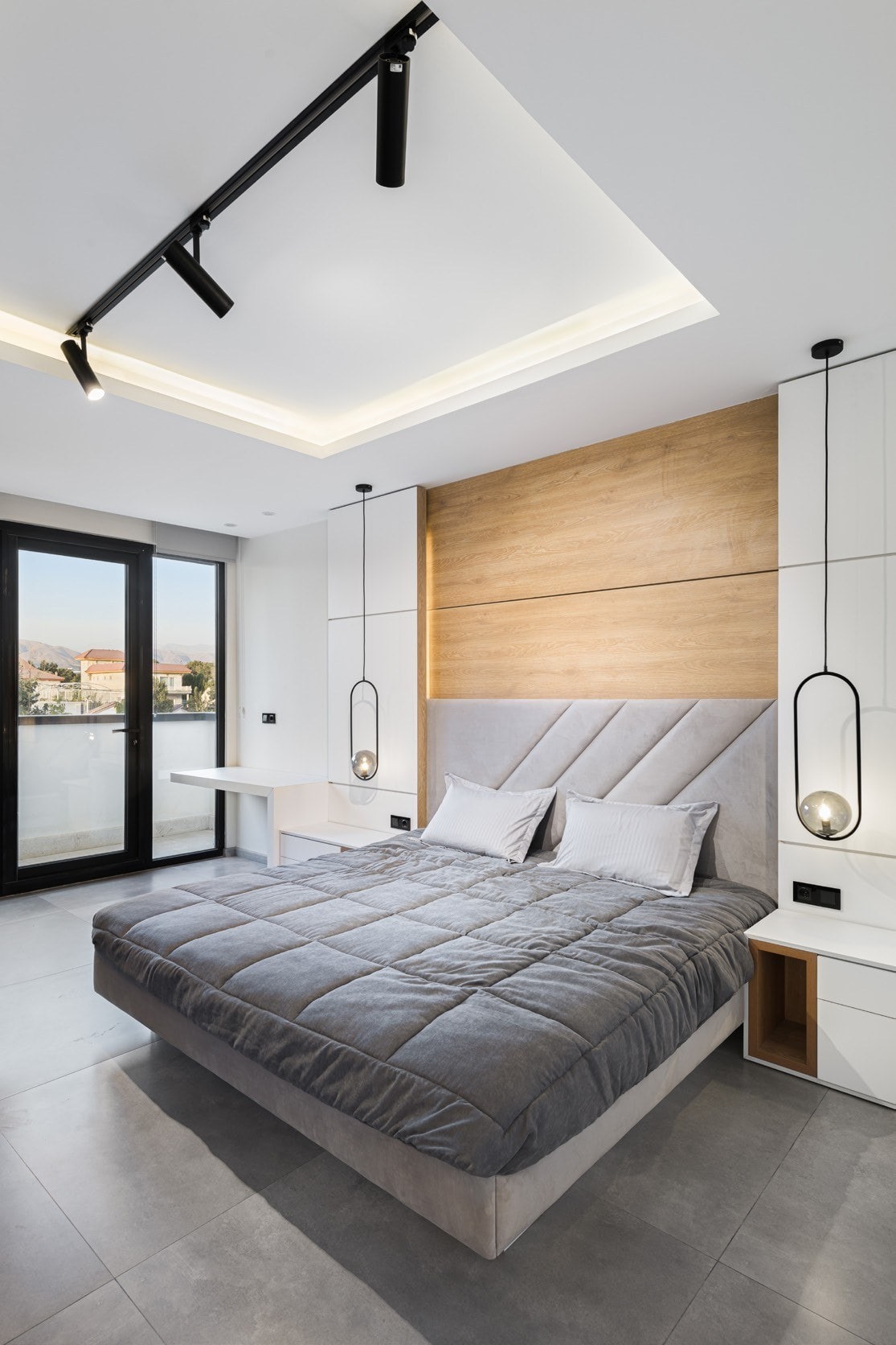 Bedroom with timber headboard wall