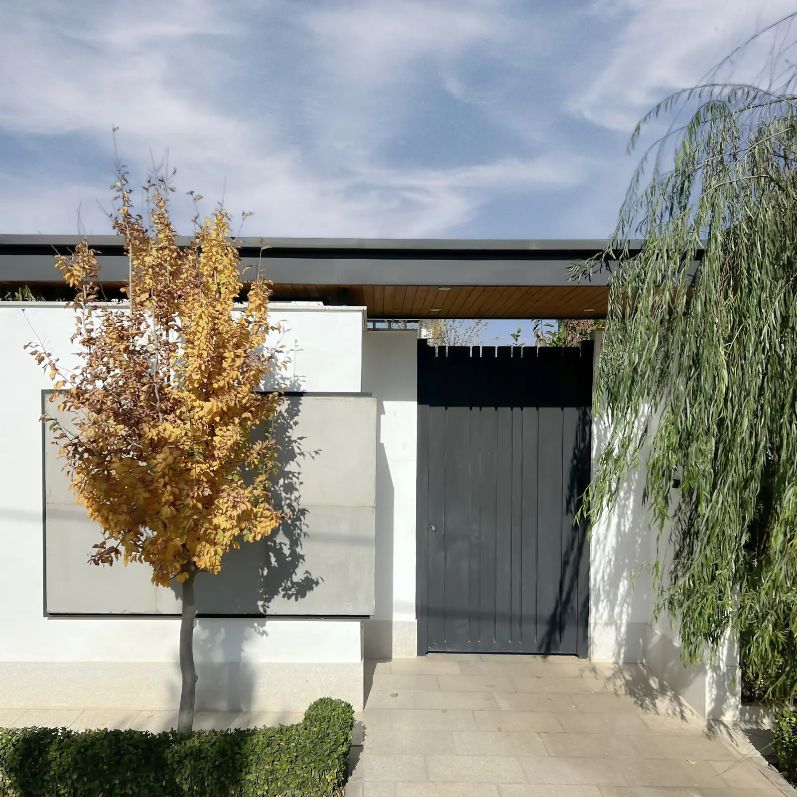 Street entrance with autumn trees