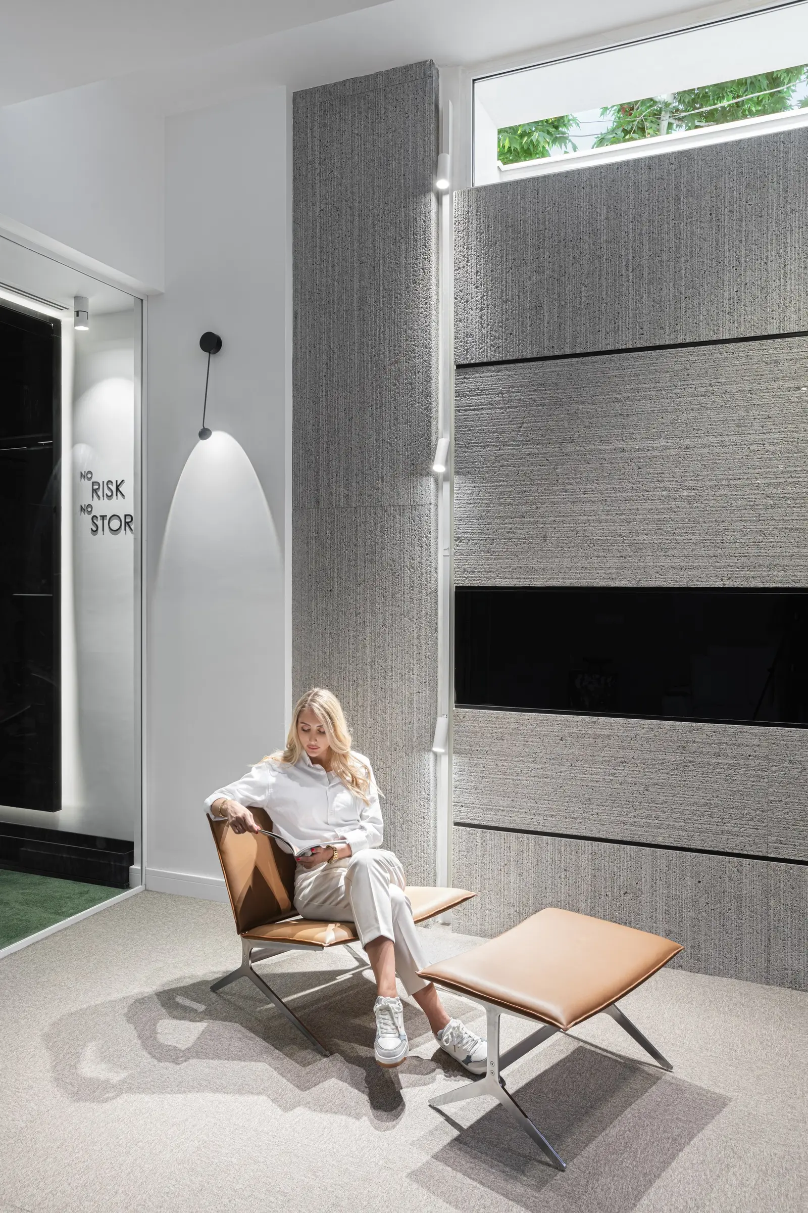 Lounge chair under a slot window