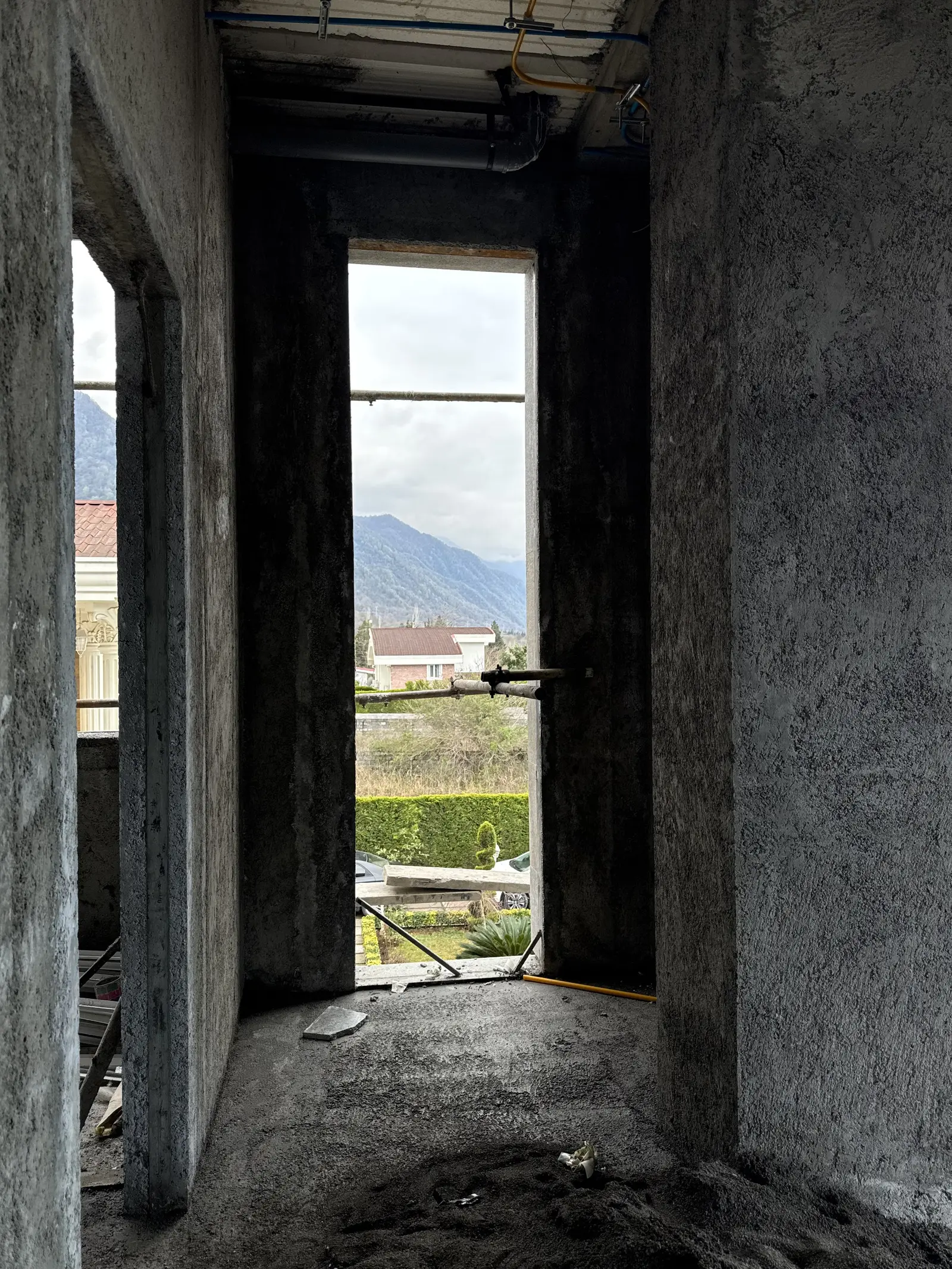 The tall slit window, unfinished
