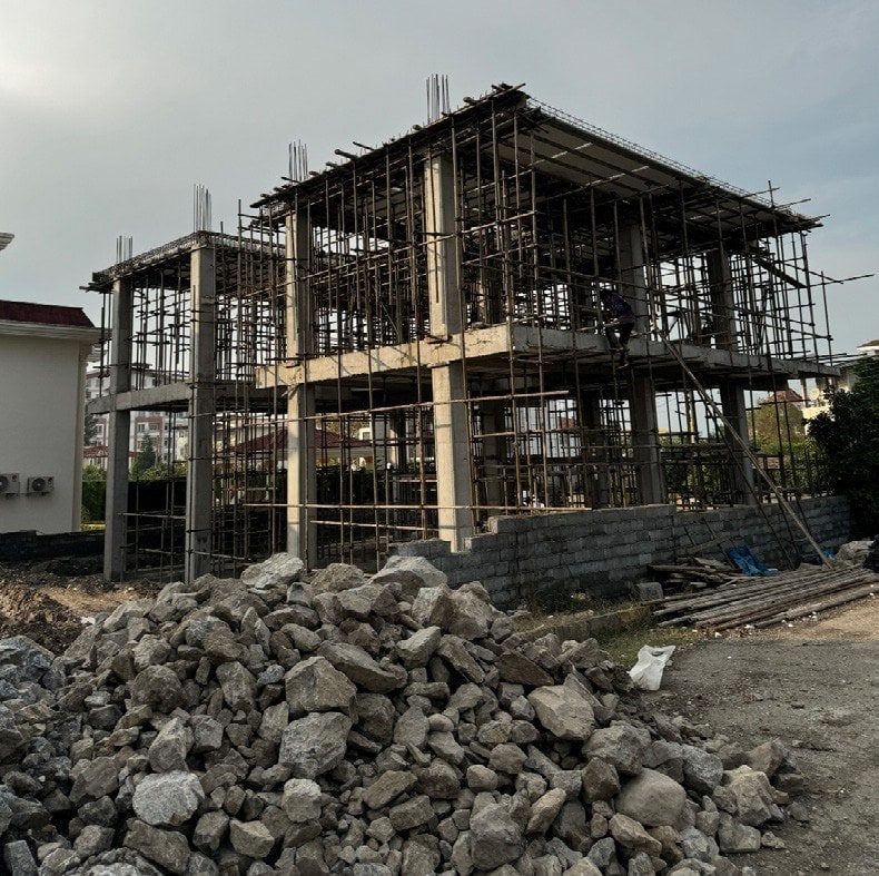 Existing concrete frame and masonry